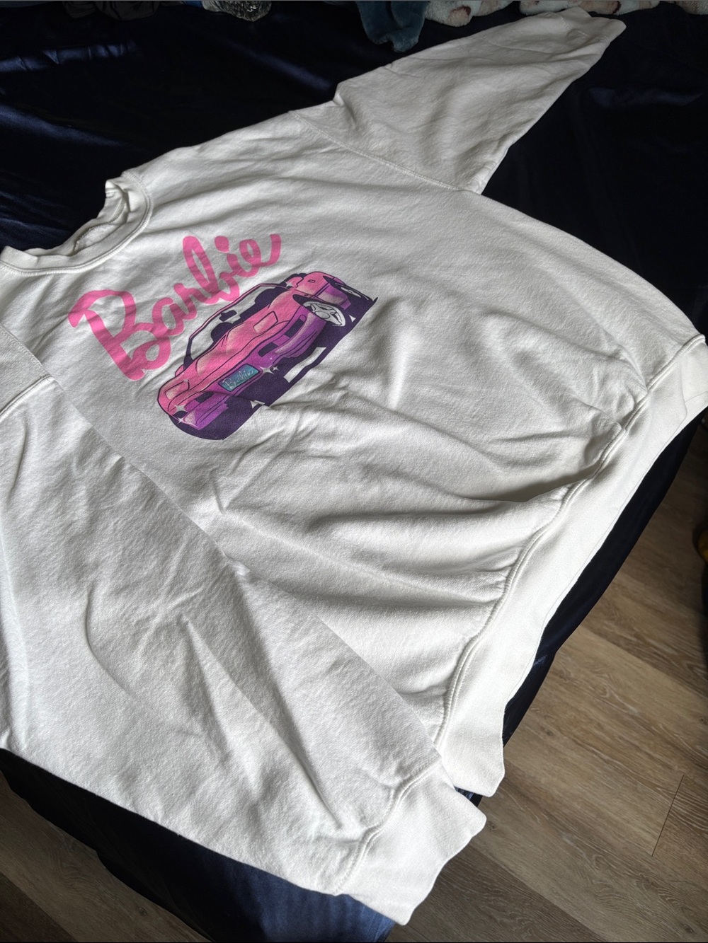 Women’s Barbie White Sweatshirt with Pink and Purple Car Graphic